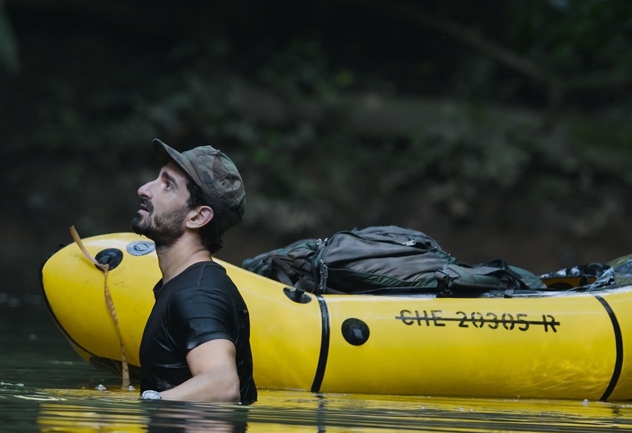 This image shows the Las Piedras river in the Amazon with a man.jpg